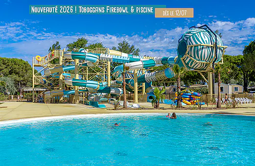 Toboggans Firebowl et piscine extérieure au camping VAGUES OCEANES Les Cigales à Moliets-Plage (40). Toboggans Firebowl et piscine extérieure au camping VAGUES OCEANES Les Cigales à Moliets-Plage (40).